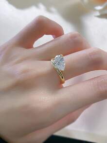 KAHOOT This Brand New 925 Sterling Silver Pear-Shaped Ring Is Set With A 1.5 Carat Teardrop-Shaped Moissanite, Making It The Perfect Choice For The Autumn And Winter Seasons. Suitable For Both Men And Women, It Can Also Be Worn As An Engagement Or Wedding Ring By Couples. Suitable For Daily Wear, Engagements, Weddings, Mother's Day, Back-To-School, Christmas, Thanksgiving, Halloween, Valentine's Day, Birthdays, And Anniversaries. - 1.5克拉 - 查看 8