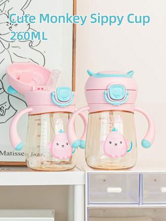 1个260毫升可爱猴子图案儿童水杯，采用防碎优质材料，带手柄、防尘防漏重力球，卡通婴儿学习杯，适合6个月以上宝宝在家、户外、幼儿园、节日礼物等场合使用。