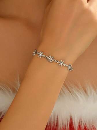 1条雪花造型仿宝石手链，优雅时尚，适合女性佩戴，可用于派对、宴会、日常佩戴，也可作为圣诞礼物送给朋友。