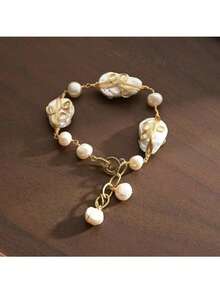 A Delicate And Elegant Twisted Asymmetrical Baroque Shaped Faux Pearl Women's Bracelet
