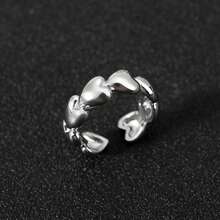 一款时尚、高端、甜美浪漫的可调节开口戒指，精致百搭，款式多样，适合日常佩戴和节日场合，可作为礼物送给朋友或爱人。