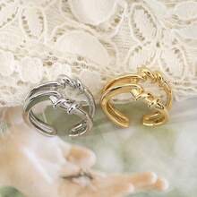 一款时尚、高端、甜美浪漫的可调节开口戒指，精致百搭，款式多样，适合日常佩戴和节日场合，可作为礼物送给朋友或爱人。