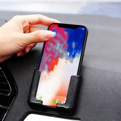 This Multi-Functional Adhesive Phone Holder Is Suitable For Cars And Walls. It's A Universal, Strong Adhesive Phone Holder That Can Be Attached To Car Dashboards, Windshields, Desks, And Home Walls. It's Convenient For Navigation, Live Streaming, Video Calls, And Casual Viewing.