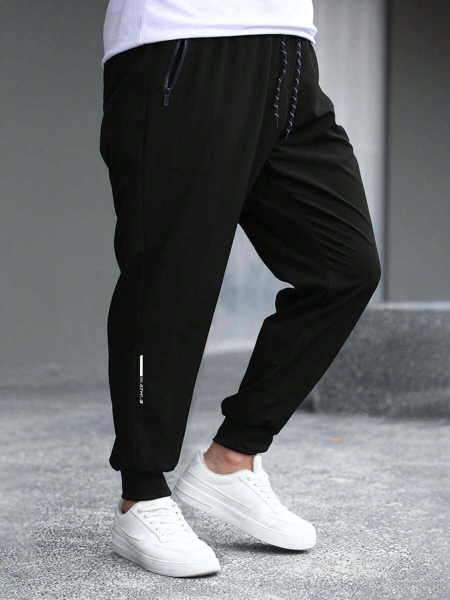 男士加大码宽松休闲运动裤,显瘦效果,春季新款黑色 - 黑色 - 查看 1