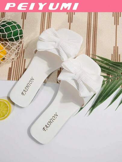 PEIYUMI Damskie klapki zdobione kokardką, modne letnie płaskie sandały