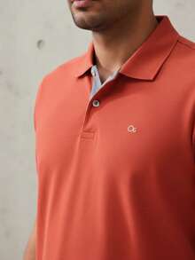 Ogochi Men's Basic Plain Polo Shirt With Logo, No Pocket, Original - Hot Sauce - View 1