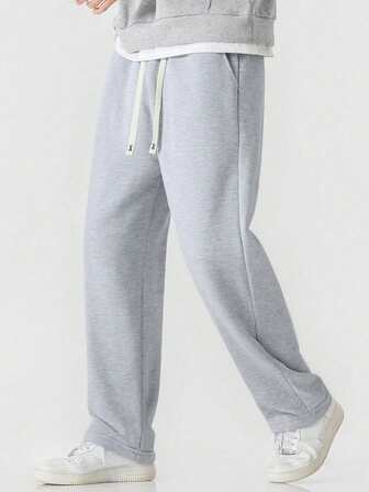 Plus Size Men's Black Knit Straight Leg Pants, Loose Fit Casual All-Match Solid Color Trousers For Spring And Autumn