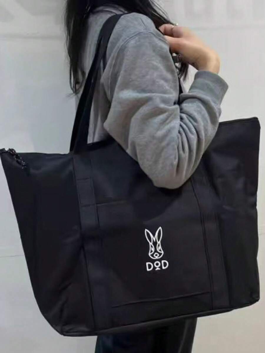 杂志增刊中的高品质防水牛津布休闲单肩包/购物袋