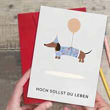 Thiệp mừng sinh nhật người lớn bằng tiếng Đức - Chú chó Dachshund đội mũ dự tiệc và bóng bay với lời chúc "Muôn năm bạn" (kèm phong bì) - Nhiều màu - Xem 2