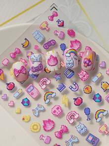 一款日式像素风美甲贴纸，采用浮雕激光技术，复古千禧风格，包含游戏手柄、游戏机、蝴蝶结等元素，适合个人DIY和美甲沙龙使用。 - 彩色 - 查看 3