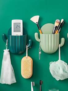 Estante de almacenamiento montado en la pared con forma de cactus para cepillos de dientes, peines y brochas de maquillaje - Adhesivo, sin marcas, de plástico duradero, caja de almacenamiento montada en la pared sin perforación con soporte para teléfono, tubo de almacenamiento para cepillo de dientes, peine, brochas de maquillaje y control remoto. Artículos de baño higiénicos y ahorradores de espacio - Multicolor - Ver 4