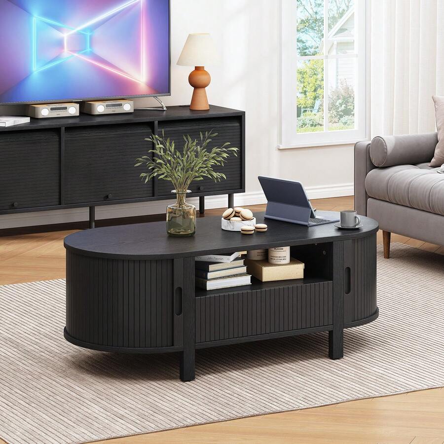 ONBRILL Black Oval Coffee Table, 47 Inch Fluted Coffee Tables With Cabinets & Sliding Doors, Mid-Century Modern Living Room Tables, Center Table With Storage And Wood Handle For Living Room, Home Small Space - Black - View 1