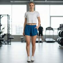 Short Corto para Mujer tipo Running con bolsas laterales para Gym y Actividades Deportivas - Agua verde azul - Ver 5