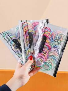 500个/套彩色发圈套装，包含粉色、蓝色、黄色、紫色等多种颜色，适合女孩和女士使用。可用于发型设计、DIY手工制作（如编织手链和项链），也可作为日常小物件的便捷收纳工具。数量充足，满足多种需求。 - 彩色 - 查看 8