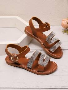 1 par de sandalias planas de color marrón talla grande para adolescentes, correas de PU de unicolor con decoración de brillantes de rhinestone, tacón en forma de S, hebilla metálica, correa con , punta redonda, antideslizante, moda y lujo, adecuado para niñas de 3 a 15 años, casual, fiesta, playa, primavera/verano 2026 - Marrón - Ver 6