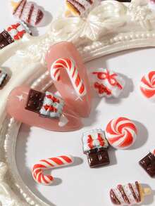50 piezas/bolsa Decoración de uñas con temática navideña - Pegatinas 3D de bastón de caramelo, piruleta, caja de regalo de chocolate, adornos para manualidades navideñas. Juego de accesorios festivos para uñas para niñas o mujeres - Multicolor - Ver 2