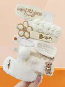 20个/套柔软毛绒针织发夹套装，采用毛绒、针织、蕾丝等材质，并饰有小熊、花朵等可爱元素——适合女孩和女士，可轻松打造慵懒马尾、俏皮半扎发或优雅发髻，是冬季的理想之选，也是馈赠佳品和发饰。