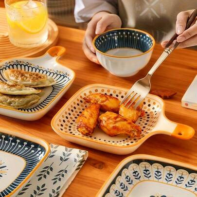 这款4件套清新时尚单柄烤盘，采用9英寸设计，适合盛放饺子和熟食。可用于户外露营和家庭烘焙，并适用于微波炉加热和冰箱冷藏。