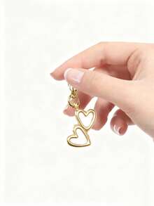 1 pieza Llavero con doble corazón dorado, colgante con forma de corazón, llavero con clip de resorte de corazón de aleación, colgante de corazón hueco, colgante decorativo con forma de corazón, llavero de coche, accesorio para teléfono, accesorio para bolso, lindo accesorio diario para bolso, llavero para parejas, recuerdo de fiesta, regalo de fiesta, accesorio para bolso, regalo multiestacional, regalo práctico para amante, amigo, familia, maestro, regalo de regreso a clases, regalo navideño - Multicolor - Ver 5