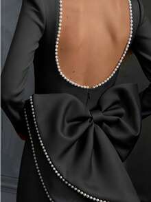 优雅女士长袖黑色鸡尾酒礼服，仿珍珠点缀露背设计，超大蝴蝶结装饰铅笔裙，适合婚礼、春季派对等场合。 - 黑色 - 查看 5