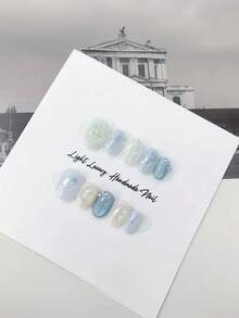 10片手工椭圆形假指甲贴纸，蓝金相间，饰以3D立体花卉图案，轻奢高端，冬季百搭Y2K风格 - 适合女孩和女士，可重复使用，适用于婚礼、派对、节日和其他场合。美甲用品，手工按压式美甲贴片 - 彩色 - 查看 3