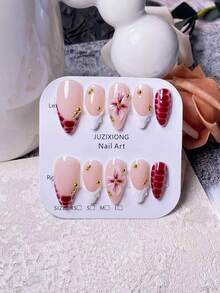 10片手工制作杏仁形紫红色豹纹法式美甲假指甲，手工四瓣花造型，饰以手工绘制的紫红色豹纹扎染法式尖角，点缀手工绘制的3D线条装饰和金色珠子，优雅浪漫的极简奢华美甲贴纸，适合日常佩戴、约会、音乐会和轻度商务场合，是送给女性和女孩的绝佳礼物。 - 彩色 - 查看 6