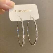 European And American Style Large Round Hoop Earrings, Inlaid With Sparkling  Stones Set In Finely Crafted Silver Posts, Exude A Confident And Sophisticated Vibe. The Exaggerated Silhouette Pairs With Versatile Elegance, Suitable For Daily Commutes Or Festive Parties, Easily Elevating Any Outfit. A Stylish Must-Have Accessory. - Bạc - Xem 1