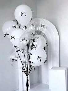 Bộ 112 bóng bay nơ đen trắng, bao gồm bóng bay trong suốt, nơ đen trắng và keo dán. Vật trang trí thiết yếu cho nhiều dịp lễ kỷ niệm như tiệc sinh nhật, kỷ niệm ngày cưới, đám cưới, Ngày Valentine, Ngày của Mẹ và quà tặng năm mới. - Đen và trắng - Xem 5