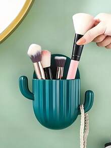 Estante de almacenamiento montado en la pared con forma de cactus para cepillos de dientes, peines y brochas de maquillaje - Adhesivo, sin marcas, de plástico duradero, caja de almacenamiento montada en la pared sin perforación con soporte para teléfono, tubo de almacenamiento para cepillo de dientes, peine, brochas de maquillaje y control remoto. Artículos de baño higiénicos y ahorradores de espacio - Multicolor - Ver 1