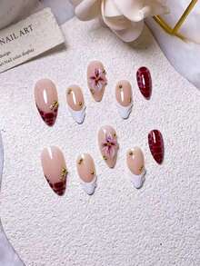 10片手工制作杏仁形紫红色豹纹法式美甲假指甲，手工四瓣花造型，饰以手工绘制的紫红色豹纹扎染法式尖角，点缀手工绘制的3D线条装饰和金色珠子，优雅浪漫的极简奢华美甲贴纸，适合日常佩戴、约会、音乐会和轻度商务场合，是送给女性和女孩的绝佳礼物。 - 彩色 - 查看 3