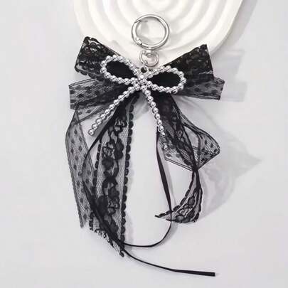 暗黑系时尚珍珠吊坠，黑色网纱包裹仿珍珠，3D蝴蝶结简约设计，尽显时尚气息，适合搭配包包和钥匙链。