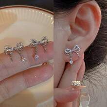 1 par de pendientes de botón elegantes con lazo, perfectos para bodas, banquetes, regalo de Navidad para mujeres, verano, joyería, festivales, elegantes - Plateado - Ver 3