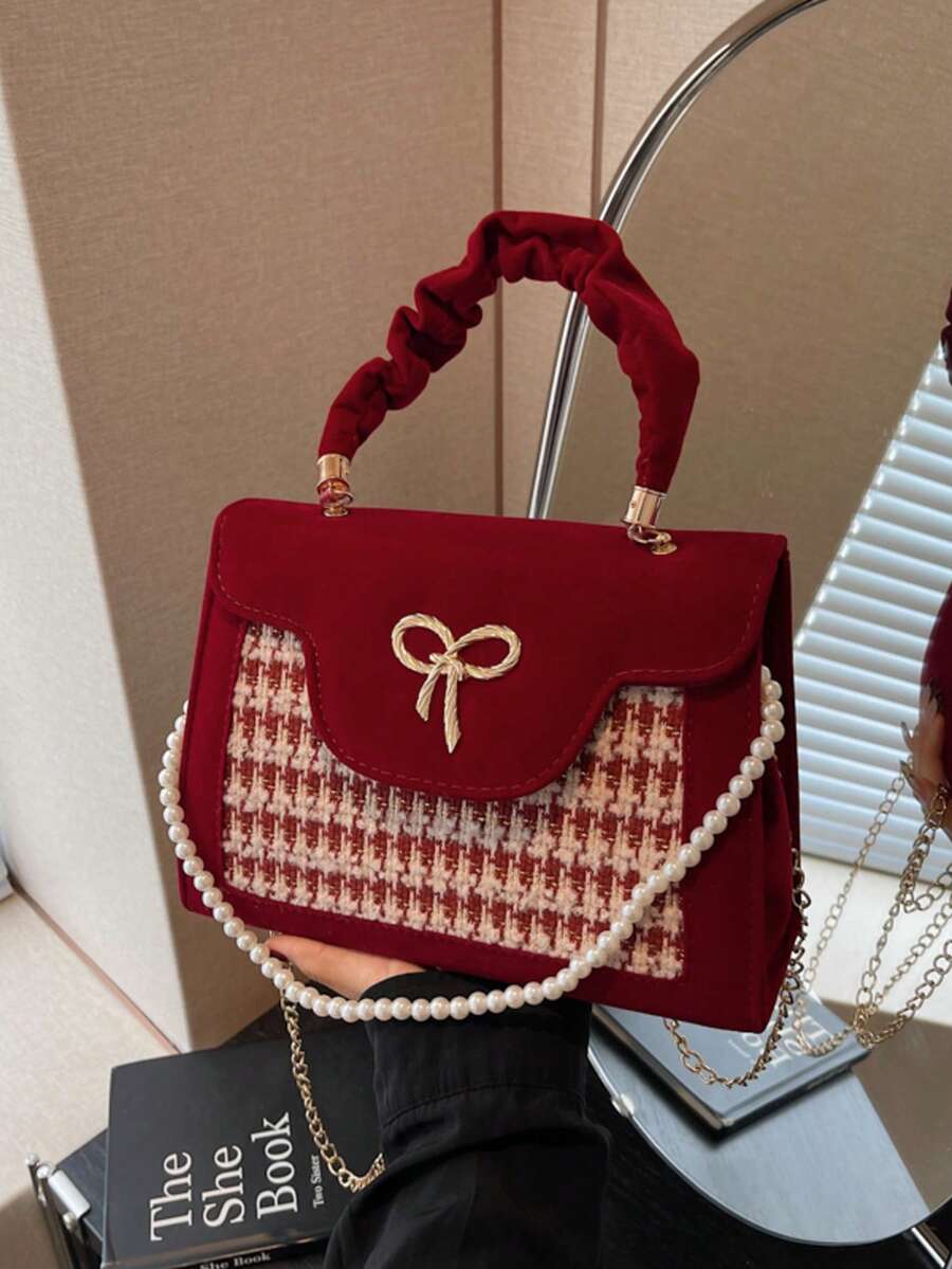 Bolso de mano y bolso de hombro de color contrastante de moda