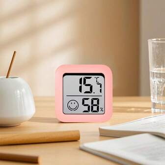 笑脸室内温湿度计，数字式室温湿度监测器，具备温湿度测量功能，快速刷新，摄氏度/华氏度切换，适用于家庭、办公室、卧室等场所，可用于湿度监测、室内环境控制、时尚设计、紧凑型传感器、耐用结构、精准传感器、湿度监测、气候追踪、家居舒适护理，是营造温馨卧室氛围的理想之选。