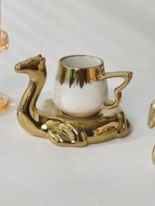 1 set Juego de taza y platillo de té con forma de animal dorado - Diseño elegante de camello y cisne, vajilla de té de cerámica de lujo con acentos metálicos, perfecto para decoración del hogar única y regalo para entusiastas del té