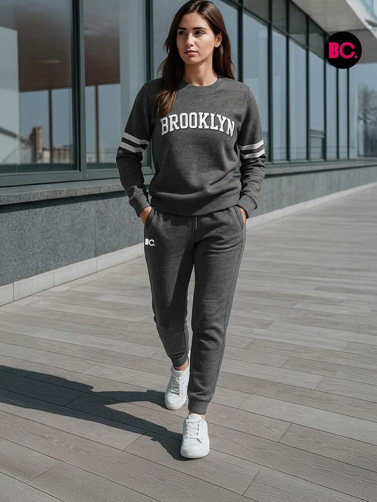 Big City conjunto para dama con sudadera y pants casual tipo jogger, ropa cómoda moderna y abrigadora, outfit femenino estilo urbano en colores negro y gris oxford ideal para invierno, casa o salidas informales - Gris Oscuro - Añade 2