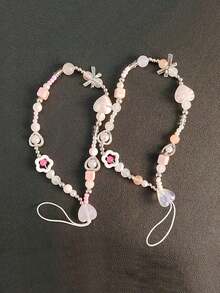 1条粉色爱心银色蝴蝶结花朵串珠手机挂绳，适用于手机、包包、钥匙链，是送给母亲、家人、朋友、生日、节日的礼物。手机挂饰，手机链，兼容安卓和大多数智能手机。 - 粉色 - 查看 6