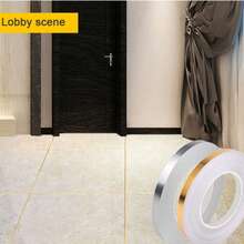 لفة بطول 50 متر من شريط لاصق مقاوم للماء لفواصل البلاط، متوفر باللون الذهبي/الفضي المصقول. هذا الشريط الديكوري لفواصل البلاط مثالي لتجميل فواصل البلاط، تصميمه اللاصق مقاوم للماء ومقاوم للبقع، بسطح ناعم وسهل التنظيف وملمس معدني يعزز التأثير الديكوري - متعدد الألوان - مشاهدة 1