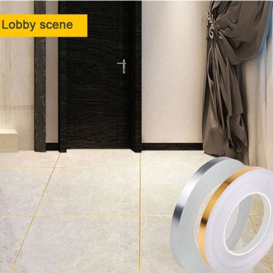 لفة بطول 50 متر من شريط لاصق مقاوم للماء لفواصل البلاط، متوفر باللون الذهبي/الفضي المصقول. هذا الشريط الديكوري لفواصل البلاط مثالي لتجميل فواصل البلاط، تصميمه اللاصق مقاوم للماء ومقاوم للبقع، بسطح ناعم وسهل التنظيف وملمس معدني يعزز التأثير الديكوري - متعدد الألوان - مشاهدة 1