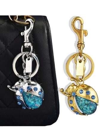1 pieza Accesorio para bolso de mujer, lindo llavero con forma de mariquita con rhinestones, soporte para llaves, decoración para bolso, accesorio de llavero para coche para mujeres y hombres, colgante decorativo de diamante azul, en color oro antiguo y plata antigua