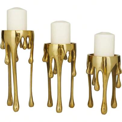 Deco 79 Aluminum Pillar Candle Holder With Dripping Melting Designed Legs Set Of 3 12" 10" 8" H Gold