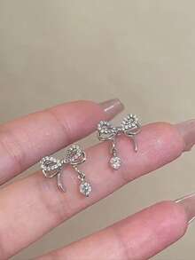 1 par de pendientes de botón elegantes con lazo, perfectos para bodas, banquetes, regalo de Navidad para mujeres, verano, joyería, festivales, elegantes - Plateado - Ver 1