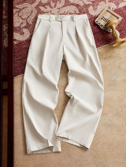 男士梭织时尚休闲纯色褶裥设计浅杏色直筒宽松长款西装裤，适合夏季、上学、秋季穿着