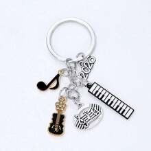 1 móc khóa hình micro, nốt nhạc, guitar, chữ cái đầu tên, móc khóa ngôi sao nhạc rock cá tính, món quà tuyệt vời, quà tặng chủ đề âm nhạc năm 2024. - Nhiều màu mới - Xem 2
