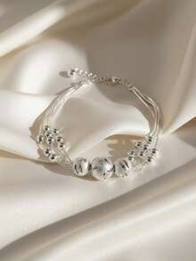 1条多层幸运珠手链，925纯银，寓意吉祥，设计优雅，是送给妈妈的绝佳礼物，也是节日佩戴的理想之选。 - 多層轉運珠手鍊 - 查看 4