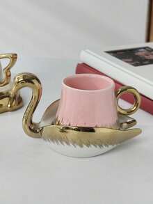 1 set Juego de taza y platillo de té con forma de animal dorado - Diseño elegante de camello y cisne, vajilla de té de cerámica de lujo con acentos metálicos, perfecto para decoración del hogar única y regalo para entusiastas del té
