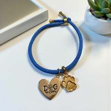 Pulsera de cordón con dije en forma de huella de pata y corazón apto para dueños de perros amorosos - Azul - Ver 1