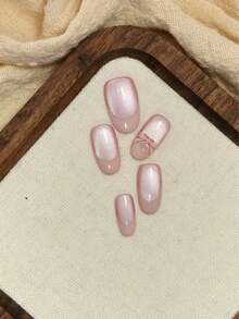 10片手工制作的按压式美甲贴片，短款椭圆形美甲贴片，粉色蝴蝶结法式猫眼图案，配3件美甲工具、美甲胶水和美甲用品，适合女性和女孩参加派对、旅行、日常上学、秋季等场合佩戴。这款按压式美甲贴片包含美甲用品、美甲饰品、短款假指甲、美甲配件、美甲艺术、夏季美甲、旅行、度假、音乐节等场合适用。 - 彩色 - 查看 2