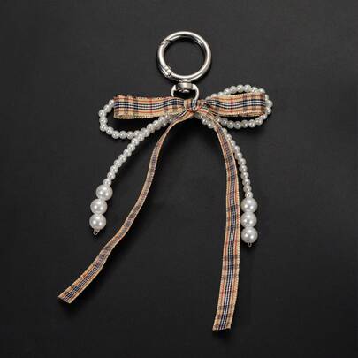 1个格子蝴蝶结仿珍珠钥匙扣，背包配件，独特手机壳串珠装饰，简约蝴蝶结设计