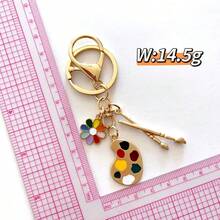 1 pezzo Set di gioielli da studente d'arte per donna, con lavagna da disegno a forma di lettera, tavolozza dei colori, pennello, portapenna a forma di cuore, perfetto come regalo di laurea, festa dell'insegnante, Ringraziamento, portachiavi, accessorio per zaino o borsa. Accessori per auto, ciondoli per borse, accessori per zaini in stile gotico Y2K, cordini con porta badge